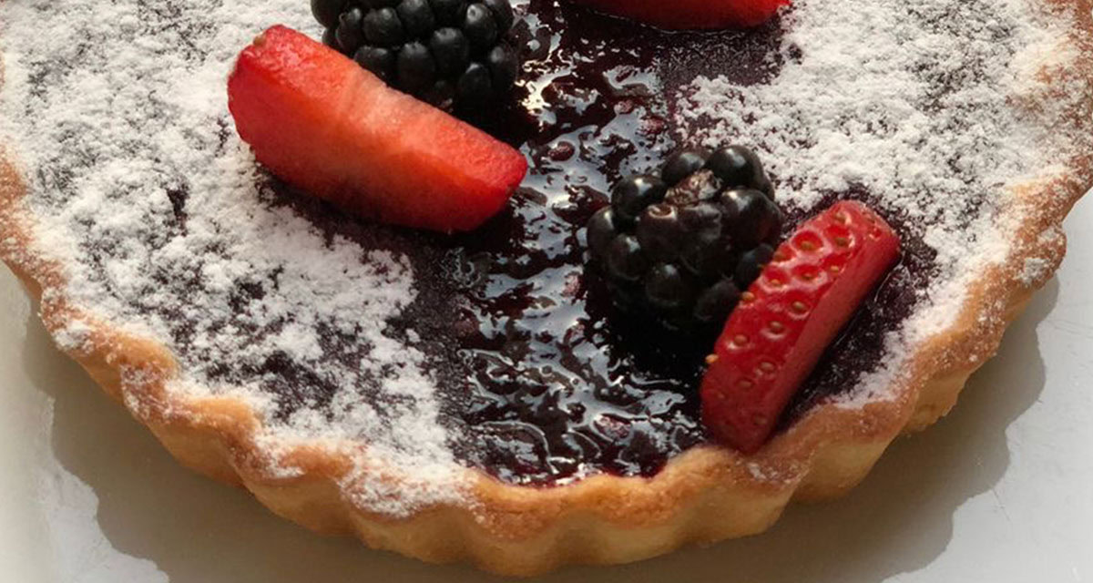 close up of a berry tart